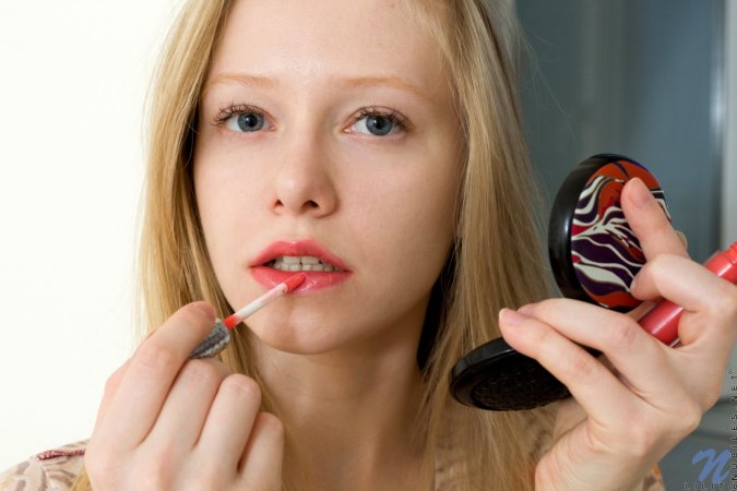 Cutie masturbates when putting on make-up photo 3