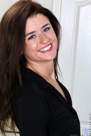 Smiling college babe is ready to relax and masturbate photo 2