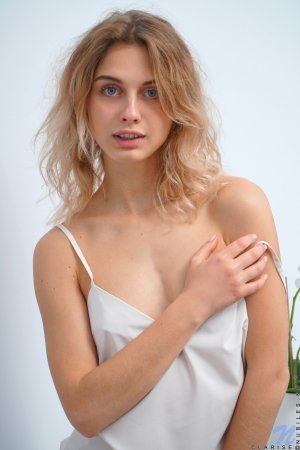 Innocent-looking small tits beauty is naked and ready photo 7