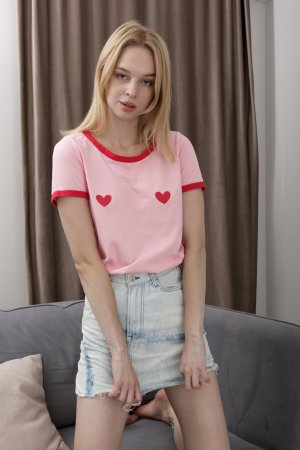 Elloise lifts her skirt to reveal her pussy in solo session photo 6